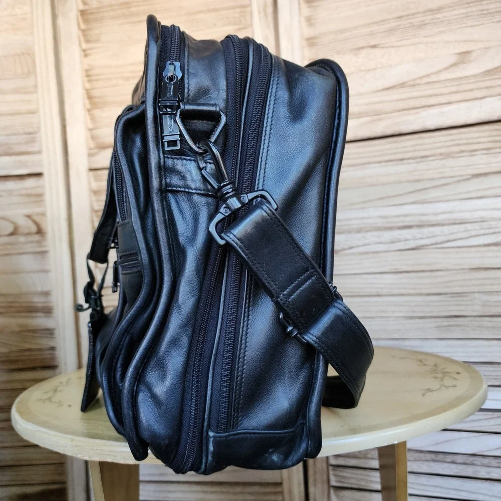 Tumi black leather